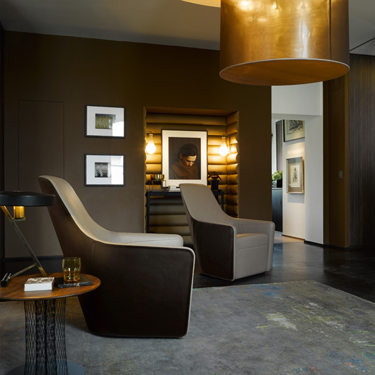 北歐法國(guó)設(shè)計(jì)師 單人椅 福斯特扶手椅沙發(fā)經(jīng)典商務(wù)休閑椅 雙色布藝西皮