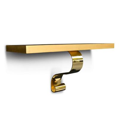 國(guó)外設(shè)計(jì) 蛇形腳 吲玄關(guān)桌蚯蚓腳 掛墻不銹鋼電鍍漂浮桌 總統(tǒng)套房家具